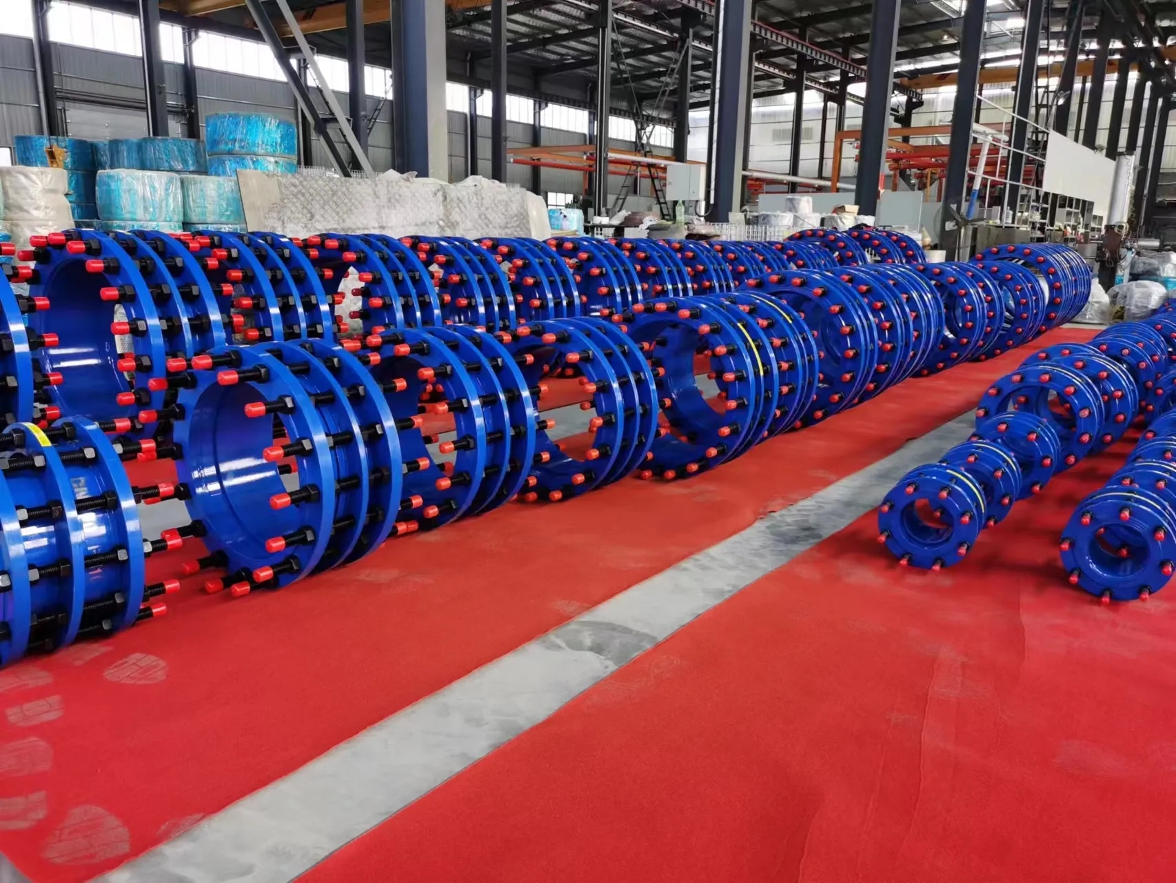 Double flange dismantling joints in multiple sizes prepared for project delivery